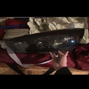 Sleek Black Car Headlight